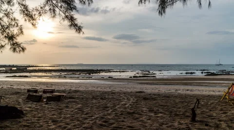 Sunset with cloudy sky, ocean and island on the horizon timelapse Stock-Footage 50554137