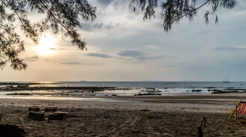 Sunset with cloudy sky, ocean and island on the horizon timelapse Video stock 50554819