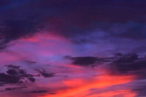 Sunset cloudy sky in purple Foto stock