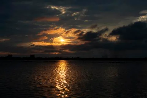 At sunset. Cloudy spectacle. Stock Photos