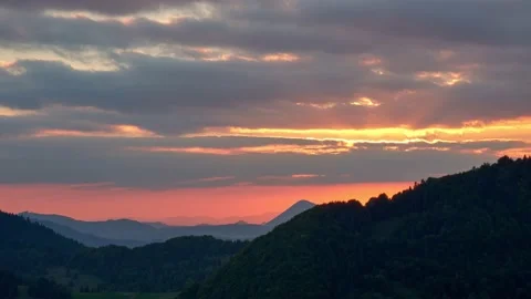Sunset in cloudy weather, forest hilly landscape, 4K timelapse Stock Footage 194102516
