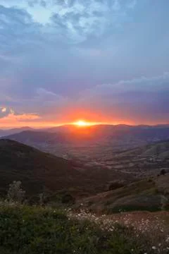 Sunset at cloudy weather Stock Photos