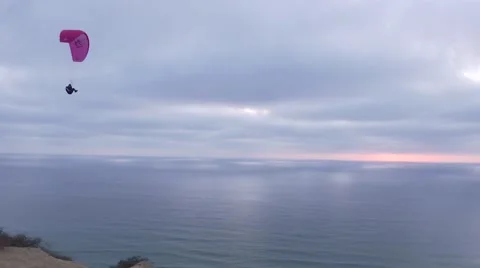 Sunset on the coast with a Hang Glider Stock Footage 68711302