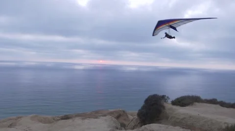Sunset on the coast with a Hang Glider Stock Footage 68711309