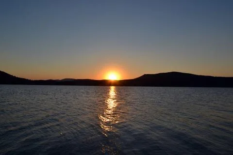 Sunset on the coast Stock Photos