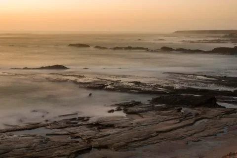 Sunset on the coast Stock Photos