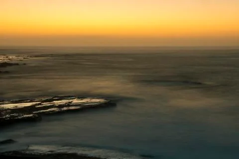 Sunset on the coast Stock Photos