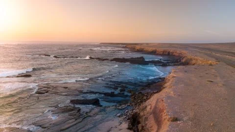 Sunset on the coast Stock Photos