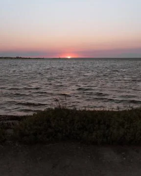 Sunset on the coast Stock Photos