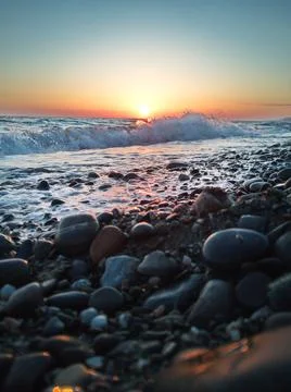 Sunset on the coast Stock Photos