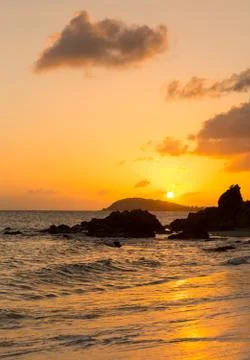 Sunset off coast of st thomas Stock Photos