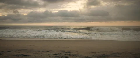 Sunset on the Coast with Waves Stock Footage 136021749