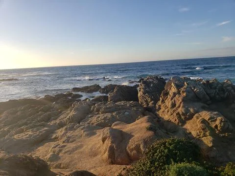 Sunset coastal cliffs 17 Mile Drive California scenic landscape Stock Photos