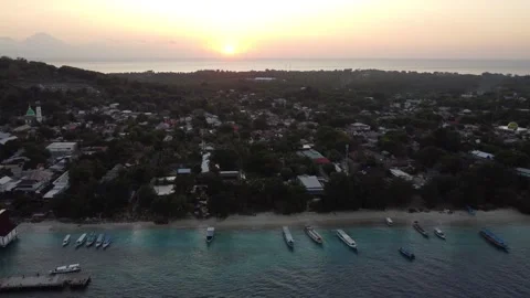 Sunset coastline with Mount Agung Stock Footage 329713891