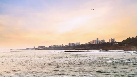 Sunset Coastline with Paragliders in Lima Peru Stock-Footage 345528489