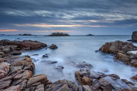 Sunset at cobo bay Stock Photos