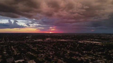Sunset with Colorful Cloudy Sky in Miami - Drone Shot of Beautiful Sunset 4K Stock Footage 243998676