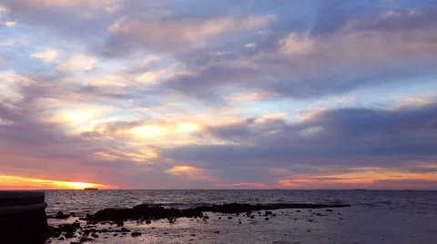 Sunset colors in clouds over Cerberus Beach Melbourne, Victoria, Australia. 库存影片 49327098