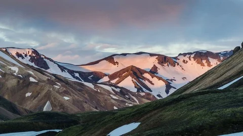 Sunset colors of mountains and clouds in Iceland. Time lapse zoom in Stock Footage 83495643