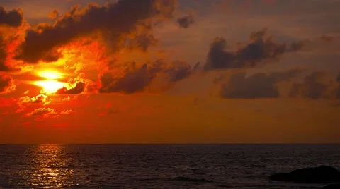 Sunset Colors over the Horizon of a Flat Tropical Sea Stock Footage 57666262