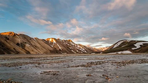 Sunset colors over river and mountains in Iceland Landmannalaugar Time lapse pan Stock-Footage 83495400