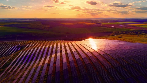 Sunset colors spread over solar panel farmland, Bulgaria Stock-Footage 345152591