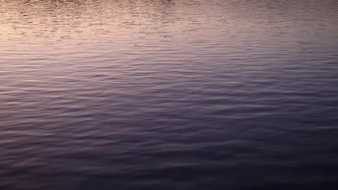 Sunset colour on water Stock Footage 247063470
