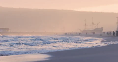 Sunset colourful sea waves at beach shore Stock Footage 145871619