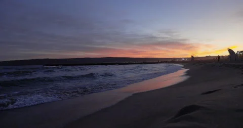 Sunset colourful sea waves at beach shore Stock Footage 146060780