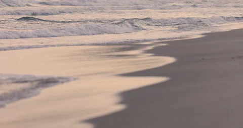 Sunset colourful sea waves at beach shore Stock Footage 146061416