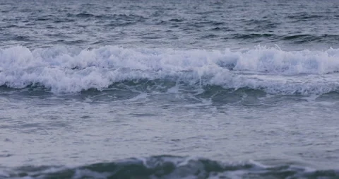 Sunset colourful sea waves at beach shore Stock Footage 146063830