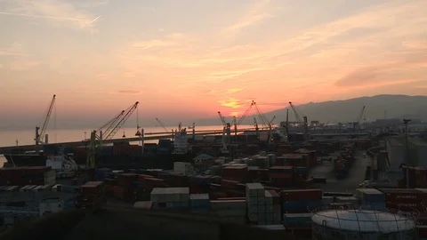 Sunset on a commercial port Stock Footage 75436389