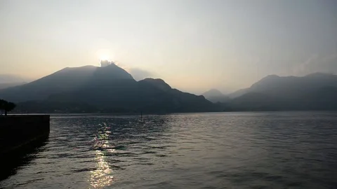 Sunset on Como lake in Italy. View from Bellagio. Landscape with Mountains. Time Video stock 121776597