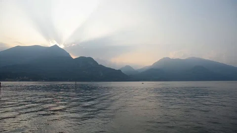 Sunset on Como lake in Italy. View from Bellagio. Landscape with Mountains. Time Video stock 121776636