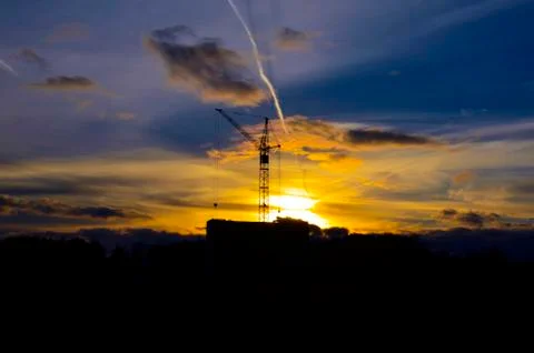 Sunset. Construction crane Foto stock
