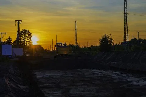 Sunset on a construction site Stock Photos