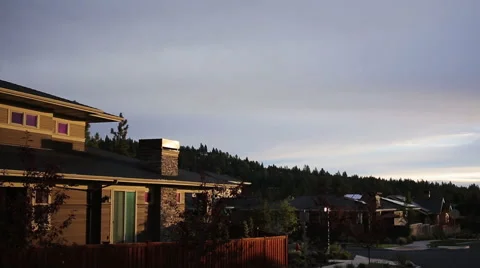 SUNSET ON CONTEMPORARY ZERO NET ENERGY HOME – PAN DOWN Stock Footage 52550408