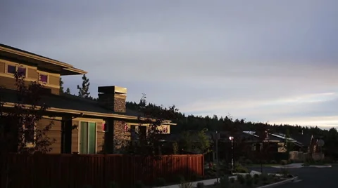 SUNSET ON CONTEMPORARY ZERO NET ENERGY HOME – PAN UP Stock Footage 52551034