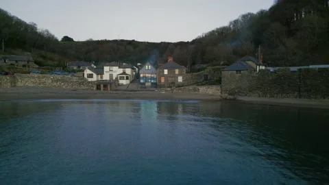 Sunset in Cornwall aerial drone footage in Polkerris Stock Footage 224702829