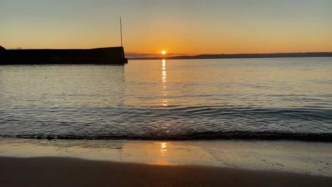 Sunset in Cornwall over the sea, Par Polkerris Stock Footage 224772059