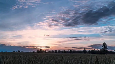 Sunset in the countryside over the field. timelapse Stock Footage 113255889