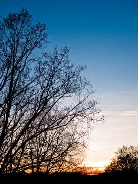Sunset in countryside Stock Photos