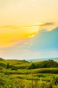Sunset in countryside Stock Photos