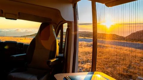 Sunset in the countryside with van Stock Photos