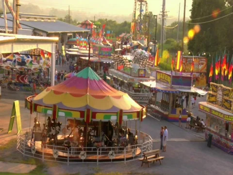 SUNSET COUNTY FAIR MIDWAY RIDES Stock Footage 498767