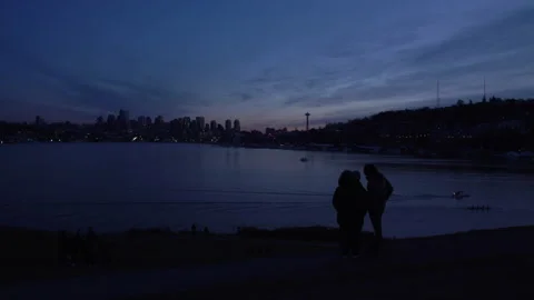 Sunset Couple with city scape background Stock Footage 165297029
