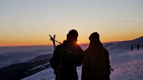Sunset Couple Winter People Ski Slowmotion Video stock 71098730