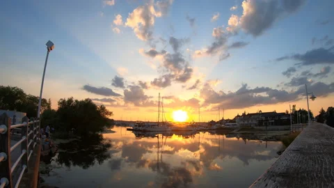 Sunset Crepuscular Sun Rays Over Marina Stock Footage 136495503