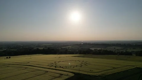 Sunset Crop Circle Drone Gliding View, 7th June 2023, Potterne Wiltshire 4K Video stock 243296670
