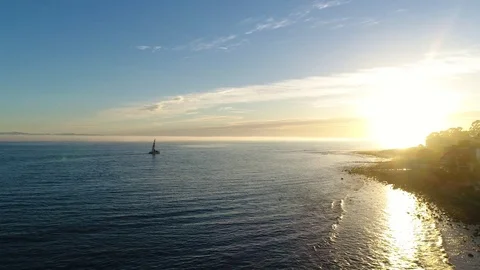 Sunset cruise into the setting sun 스톡 동영상 77731160